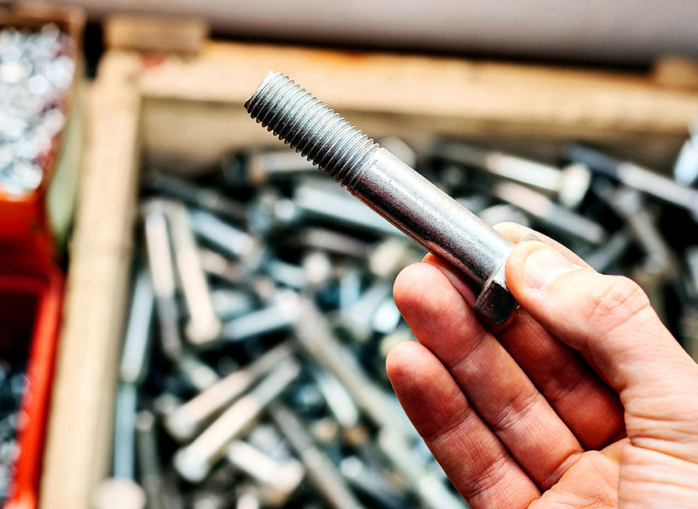 Close up of various nuts, bolts, and screws.